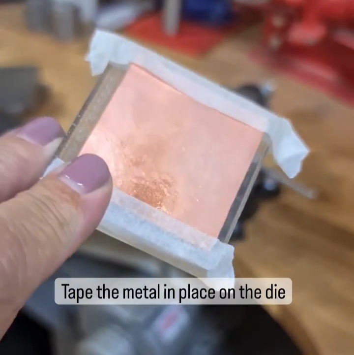 tape the metal on the die, textured surface down